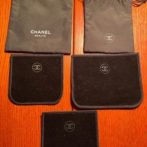 5 authentic CHANEL black pouches